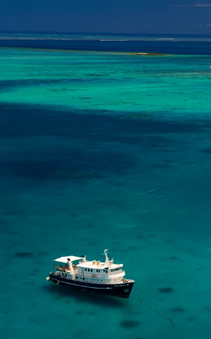 Aerial photo of the Ocean Hunter, Palau premier liveaboard in turquoise waters