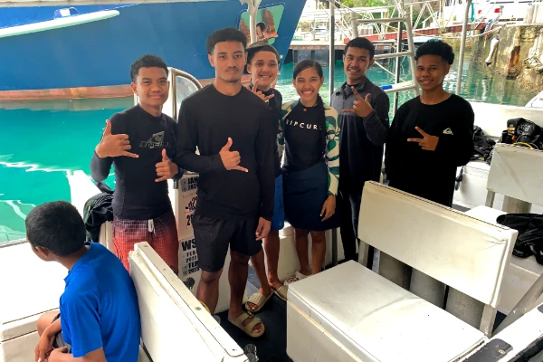 Children learning scuba diving in Palau