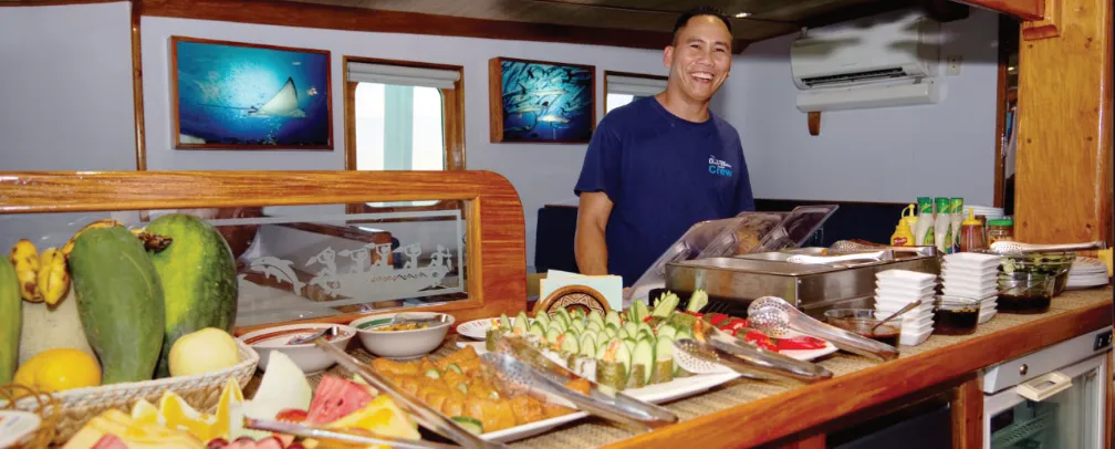 Chef of the Ocean Hunter serving lunch