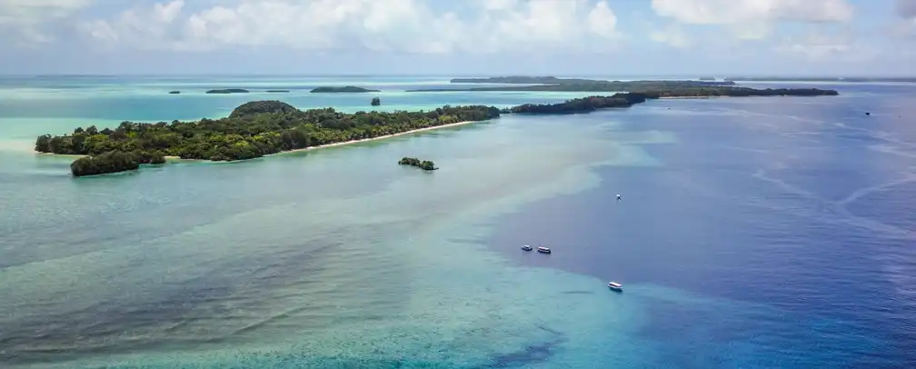 aerial photo of Ngemelis island area in Palau, home to the famous Blue Corner Dive Site
