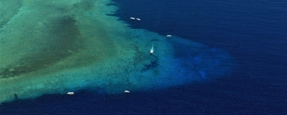 Famous dive site Blue Corner aerial photo