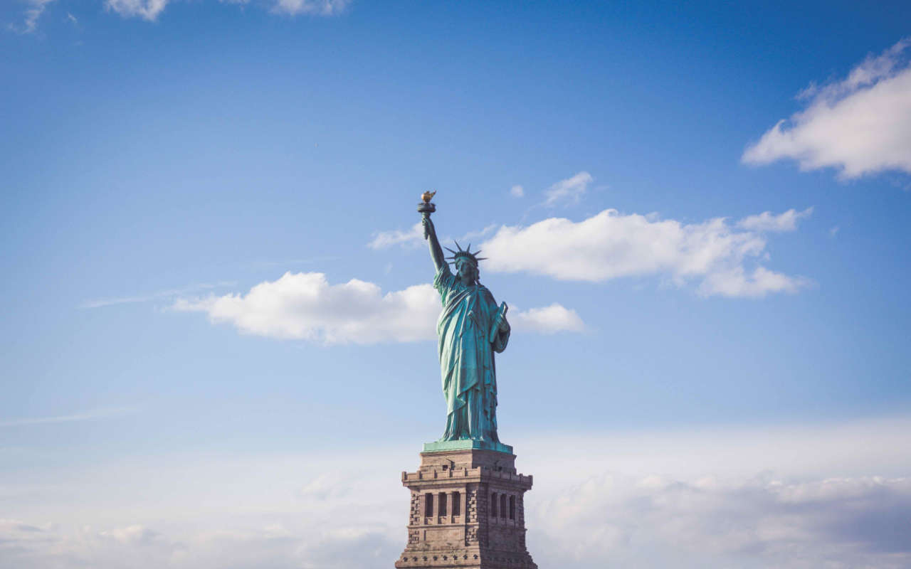 frontal photo of the statue of liberty in new york city, USA